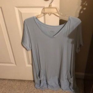Logo brand long top with ruffles and pockets. Size L, excellent condition.